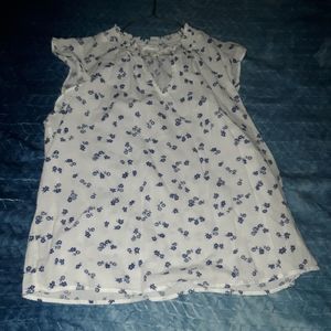 White blouse with blue flowers